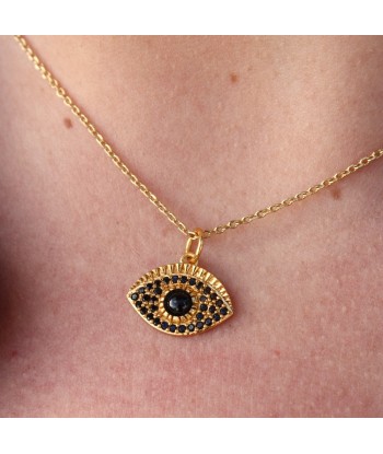 Collier doré et oeil pierre et zircons Dans la société mordern