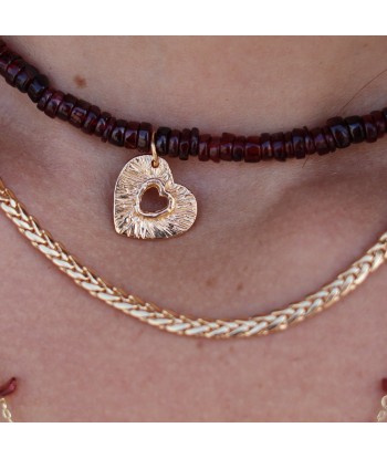 Collier doré et pendentif coeur texturé s'inspire de l'anatomie humaine